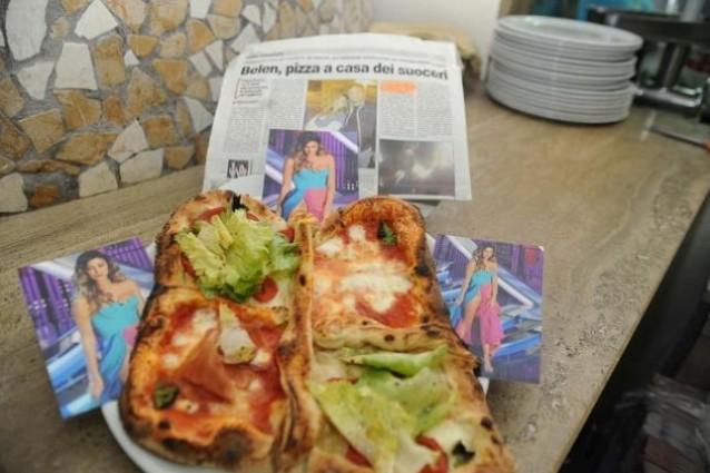 La pizza di Belen nel gossip della settimana.