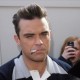 Robbie Williams: “Come mi mantengo in forma? Facendo tanto sesso!”