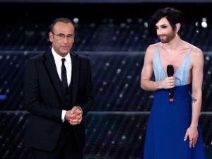 Conti chiama Tom Conchita Wurst. Lei risponde a Luxuria: 