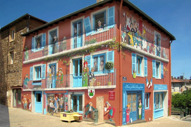 Street art iperrealista: quando le facciate dei palazzi prendono vita