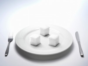 Sugar placed on white dish