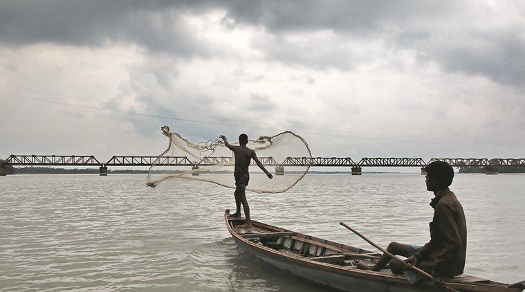Pescatori sul fiume Tista