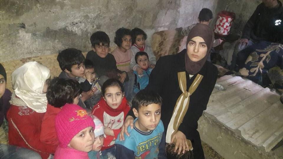 Un gruppo di bambini in un rifugio sotterraneo nella Ghouta orientale (Deanna Lynn)