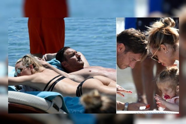 Ilary Blasi tentatrice a Mykonos ma Francesco Totti, distratto, si addormenta al sole