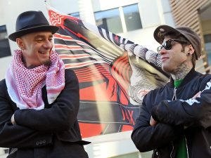 Fedez e J-Ax contro un locale di Milano: 100mila euro di danni per un fotomontaggio