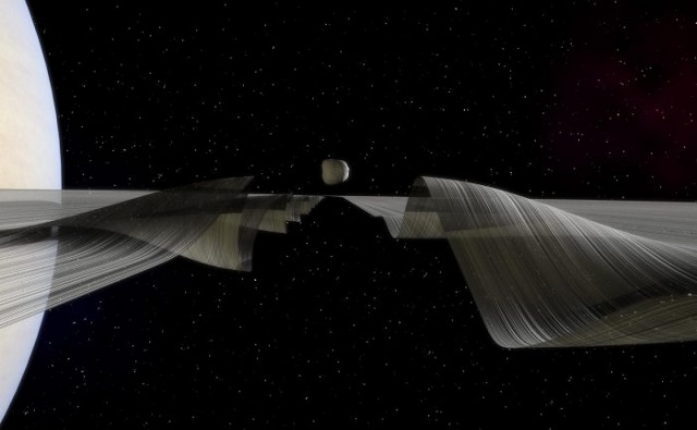 Il passaggio di Dafni genere il moto ondoso sull'Anello A di Saturno - Illustrazione di Kevin Gill NASA/JPL